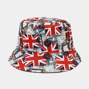Detail of cotton bucket hat with London street patterns, Union Jack and double-decker bus