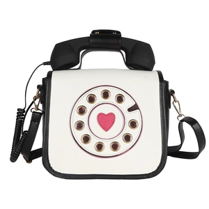 Vintage retro telephone style handbag in white and black with pink heart dial accent