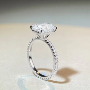 4-carat radiant cut moissanite ring in 925 silver with side stones and polished band