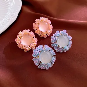 Elegant 3D rose flower stud earrings with center gemstones in a French retro style