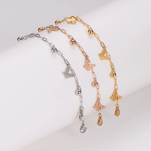 Minimalist butterfly charm bracelet in gold, silver and rose gold stainless steel