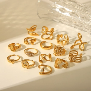 Detailed view of adjustable gold-plated stainless steel rings with minimalist designs