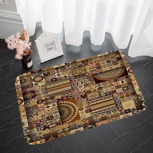 Detail of bohemian flannel mat with mandala patterns on dark wood floor with home decor