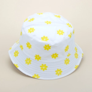 White bucket hat with yellow daisy floral print featuring multi-row stitched brim