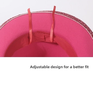 Adjustable red ribbon strap inside a pink glitter cowboy hat for a custom head fit