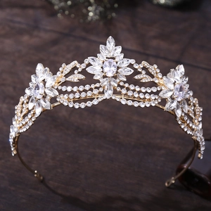 Floral bridal tiara in gold finish with sparkling crystals and leaves for wedding style