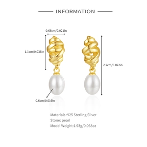 Detail view of s925 silver twist star hoop earrings with white oval baroque pearl drop