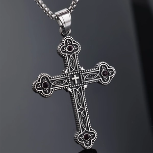 Vintage silver Viking cross pendant necklace with dark red stones and intricate relief