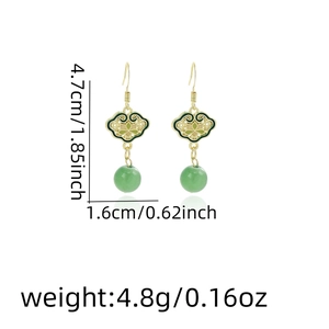 Detailed dimensions of green bamboo leaf tassel earrings with gold cloud pattern details