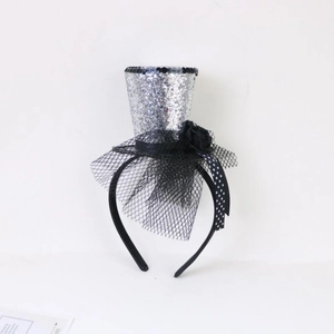 Detail of silver sequin mini witch hat headband with black lace and rose decoration