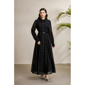 Elegant black long-sleeved dress with lace panels, shirt collar, and waist-cinching belt