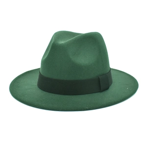 Classic dark green wool fedora hat with black ribbon band and indented crown