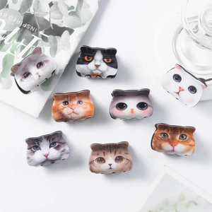Simpatiche mollette per capelli a forma di gatto in vari motivi come calico e tigrato