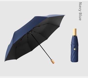 Navy blue folding umbrella with sun protection coating and classic wooden handle