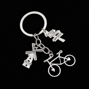 Silver zinc alloy bicycle keychain with windmill and success money happiness charms