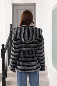 Rear view of a grey and black striped faux fur hooded coat with premium soft texture