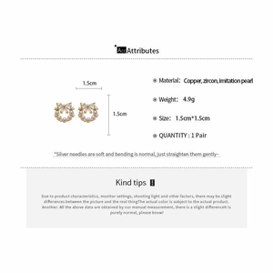 Detail showing 1.5cm golden wreath earrings with zircons and imitation pearls