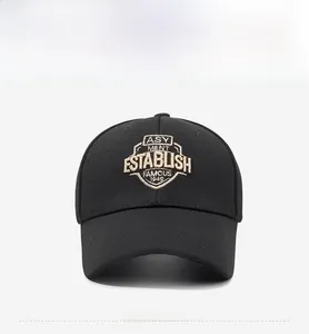 Close-up of vintage shield embroidery on high-quality black twill baseball cap fabric
