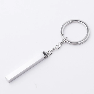 Polished silver stainless steel rectangular bar keychain with circular key ring on white background
