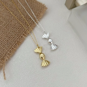 Collana con ciondolo a caramella in argento sterling S925 nelle finiture oro e argento