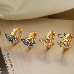 Gold-plated fan-shaped hoop earrings with blue and white baguette-cut zircon gemstones