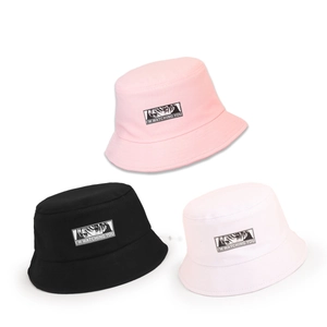 Fashionable wide-brim bucket hat for kids in pink, black and white cotton with eye embroidery