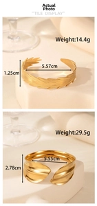 Detailed view of gold stainless steel cuffs with weight and dimension specifications
