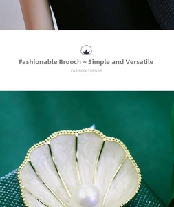 Macro detail of French vintage shell brooch with white pearl on green textured fabric