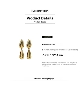 Detail view of 18k gold plated copper teardrop earrings with a polished mirror finish