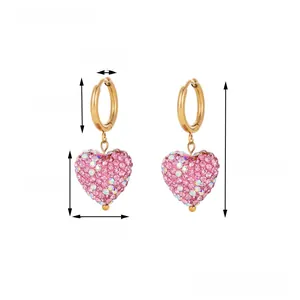 Detailed view of pink rhinestone heart earrings with product dimensions and weight