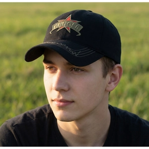 Close-up of black cotton baseball cap with embroidered Ranger text and red star shield logo