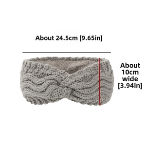 Detail view of grey cable knit headband with dimensions 24.5cm by 10cm fleece lining