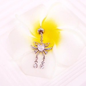 Silver stainless steel nipple ring with heart zircon and bow charms on a frangipani flower