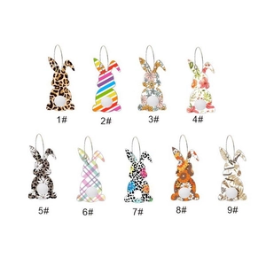 Nine Easter bunny earrings featuring floral and leopard prints with pom-pom tail detail