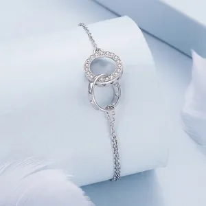 Elegant S925 sterling silver interlocking double circle bracelet with white zircon stones