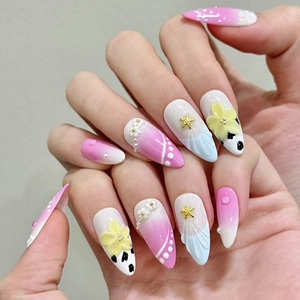 Handmade island resort style press-on nails with 3D flowers and shell textures