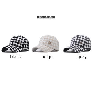 Three houndstooth tweed baseball caps in black, beige, and grey with M metal emblem