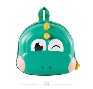 Detail view of the green dinosaur hard shell backpack with orange back fins and zip