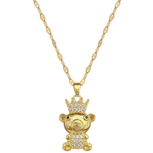 Luxurious gold titanium steel necklace featuring a sparkling crystal crown pig pendant