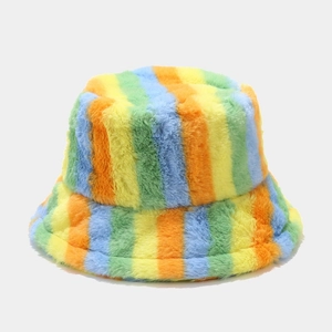 Detailed view of colorful plush rainbow striped faux fur texture on bucket hat