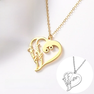 Detail of 18K gold heart pendant necklace with Family script and silver variant