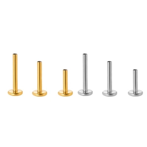 Set of surgical stainless steel flat back stud piercings in gold and silver finishes