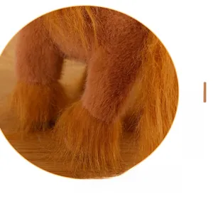 Detail of soft plush horse toy showing fluffy brown fur and high quality stitching
