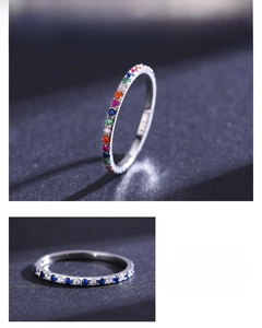Detail of s925 silver eternity rings featuring rainbow and blue pave-set crystals