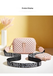 Pink crossbody camera bag with circle pattern and detachable small coin purse accessory