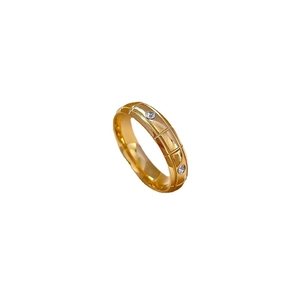 Minimalist gold titanium steel ring with geometric lattice pattern and small crystals