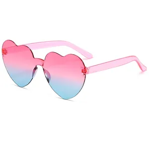Pink and blue gradient heart-shaped rimless sunglasses with translucent temples