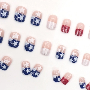 Sparkly red and blue glitter press-on nails with US flag stars design in round shape