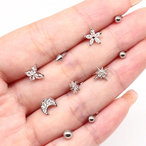 Surgical stainless steel labret studs featuring heart butterfly and moon motifs