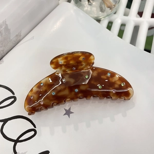 Brown tortoiseshell acetate hair claw clip with colorful rhinestones for women